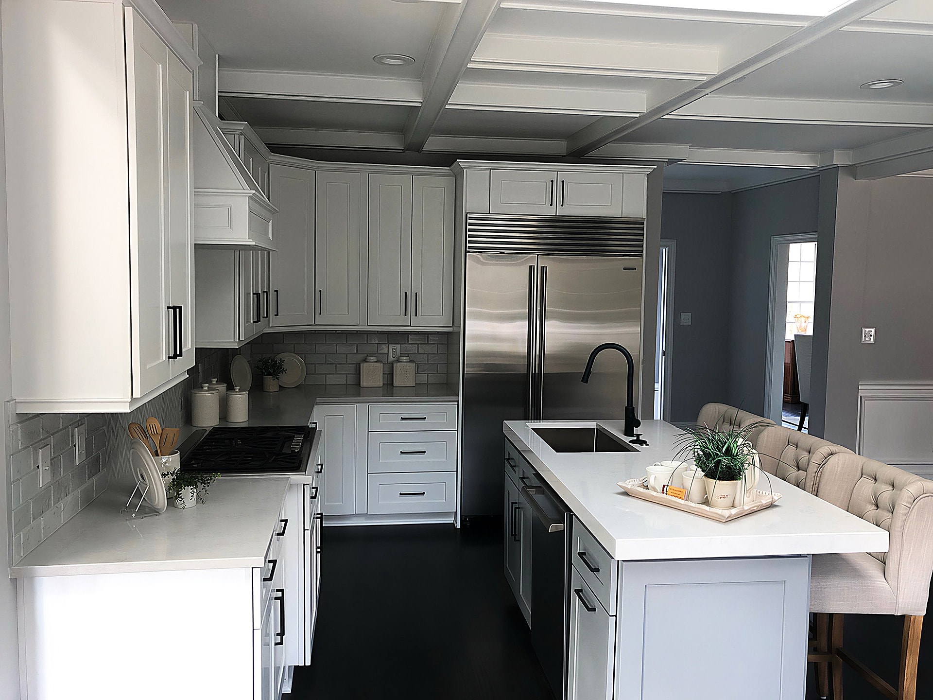 Coffered ceiling kitchen with stainless steel built-in refrigerator